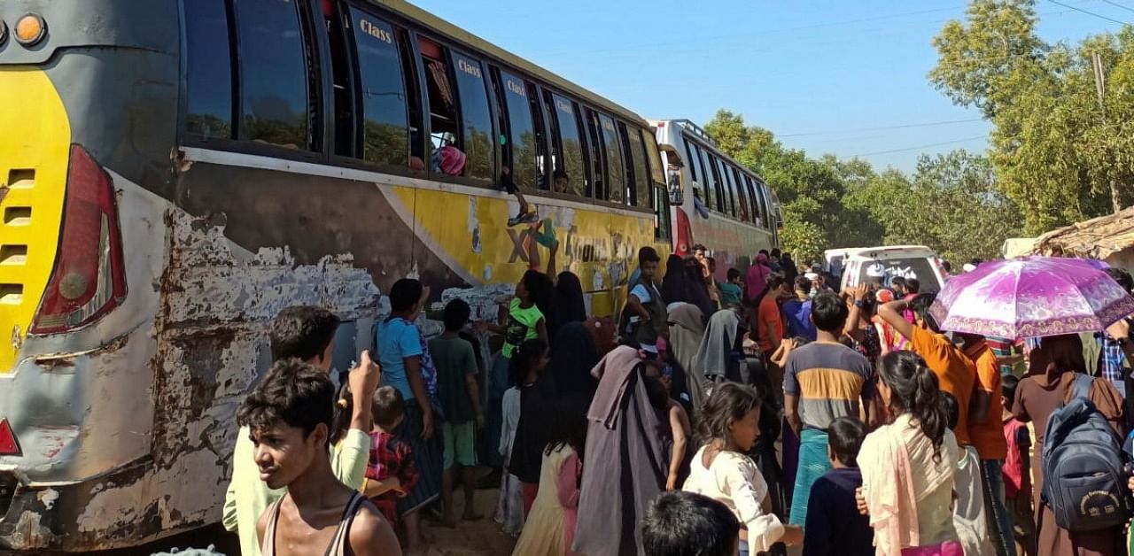 Buses wait to carry Rohingyas from a refugee camp of Cox's Bazar to Chattogram, from where they will eventually be shifted to Bhasan Char island. Credit: Reuters Photo