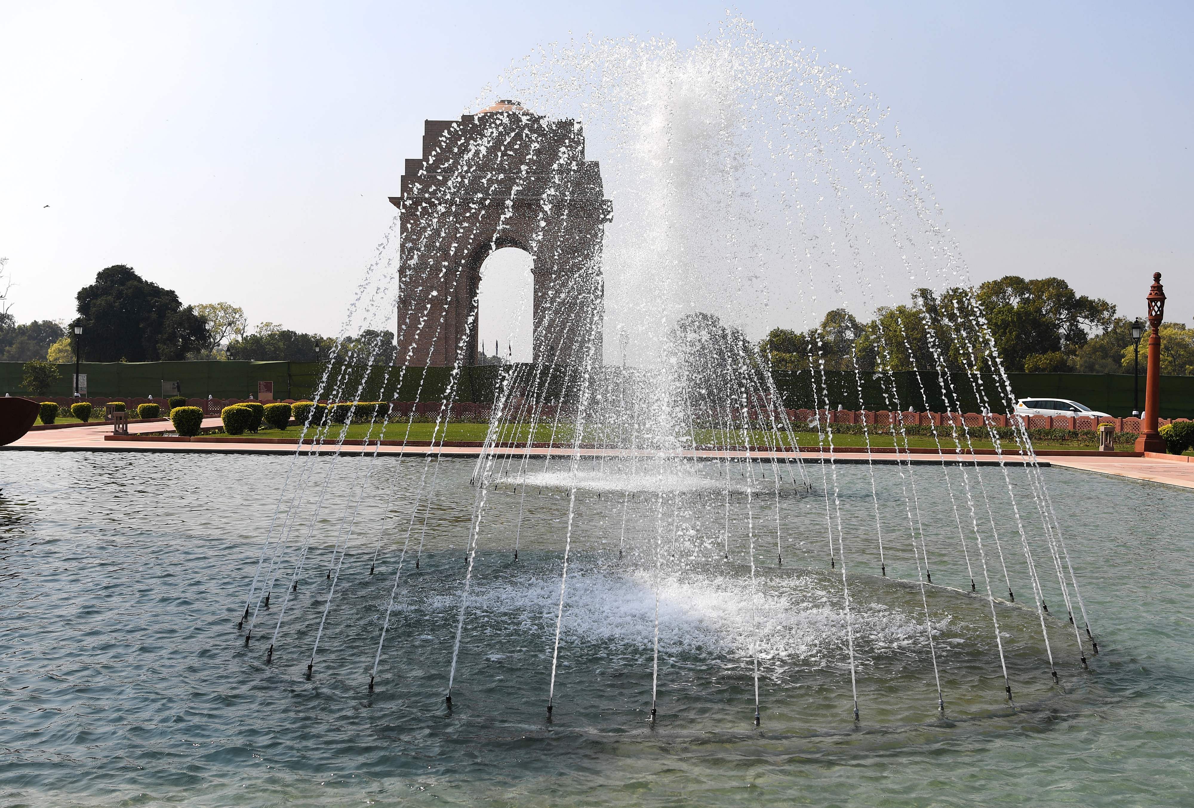 The India Gate Monument is seen behind a fountain in New Delhi. Credit: AFP File Photo