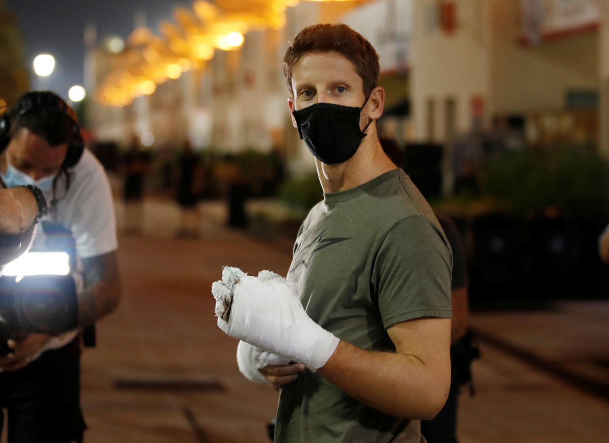 Haas' Romain Grosjean arrives to thank marshals ahead of the Sakhir Grand Prix. Credit: Reuters photo. 