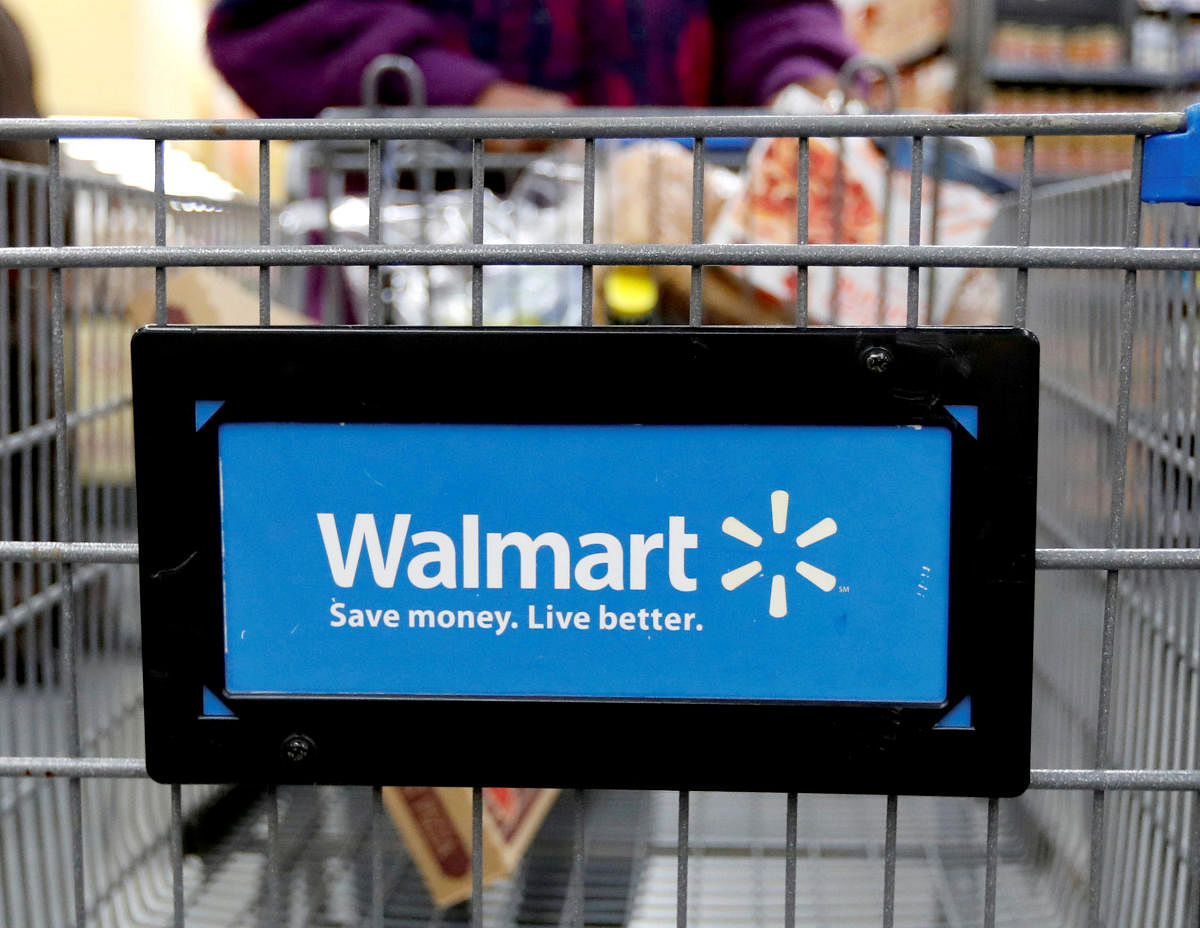 A customer pushes a shopping cart at a Walmart store in Chicago, in this file photo. REUTERS