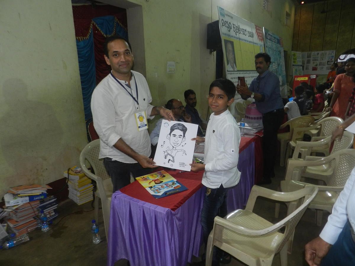 Satish Acharya at an earlier edition of the annual cartoon festival.