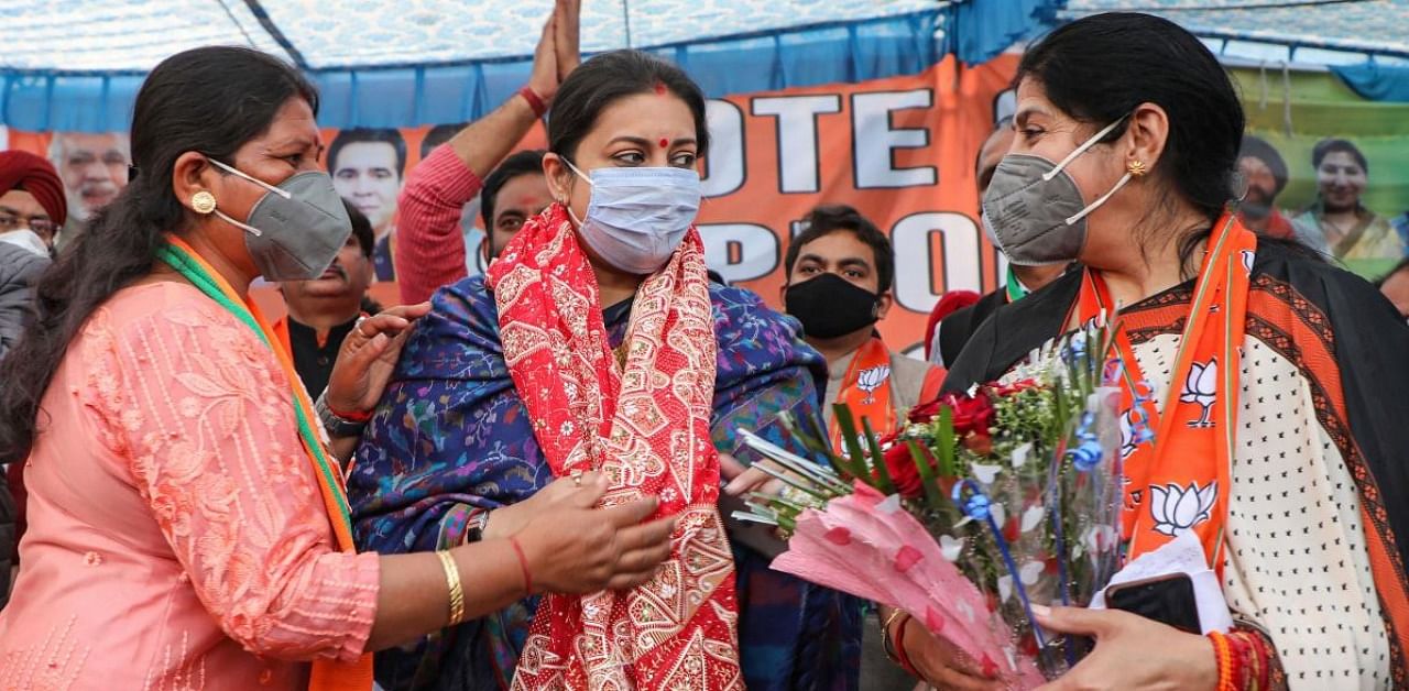 BJP leader and Union Minister Smriti Zubin Irani is felicitated by party workers during a District Development Council (DDC) election campaign in Jammu. Credit: PTI.