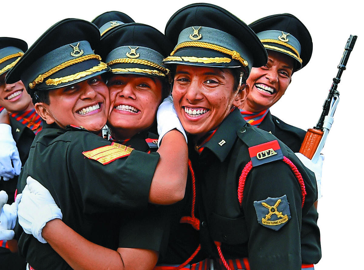 Women cadets celebrate after a passing-out parade at the Officers Training Academy in Chennai. The Supreme Court in February this year directed the Centre to grant permanent commission to all women officers in the Army within three months. PTI FILE PHOTO