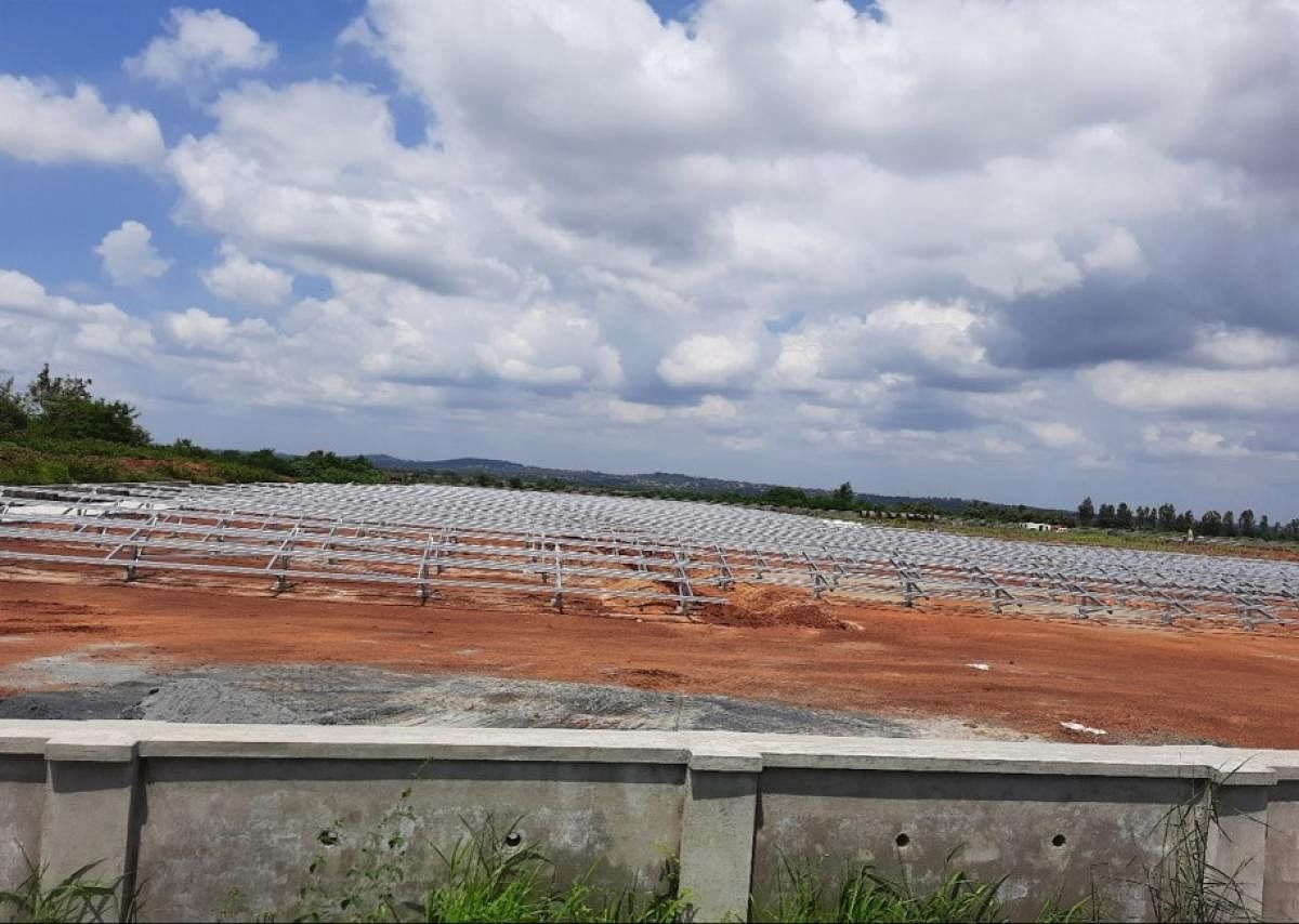 Work on installing more than 22,500 solar panels is underway at the Hubballi airport. DH photo