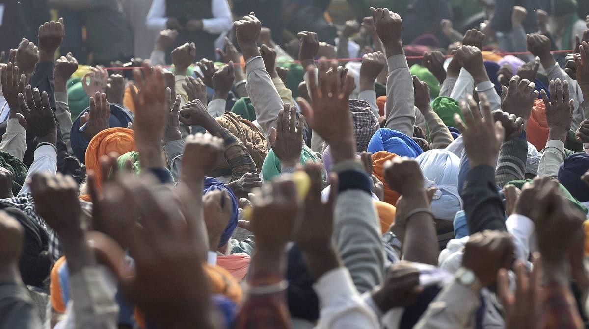 Farmers shout slogans at Singhu border during their 'Delhi Chalo' protest march against the Centre's new farm laws, in New Delhi, Wednesday, Dec. 2, 2020. Credit:PTI Photo