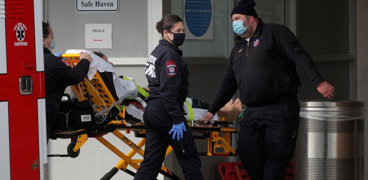 A patient arrives outside Maimonides Medical Center, as the spread of the coronavirus disease continues, in Brooklyn. Credit: Reuters.