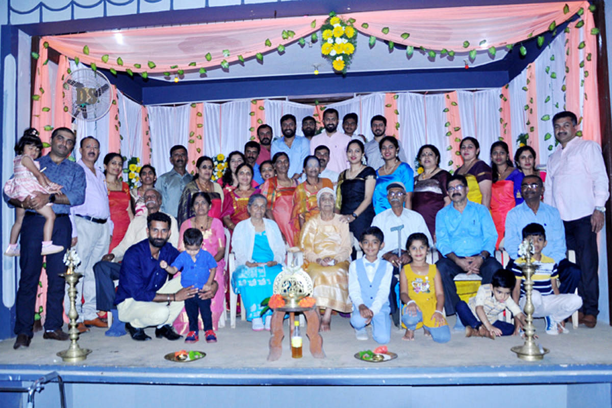 Seetavva Ganapathy is flanked by her family members, during her 100th birthday celebrations, on Sunday.