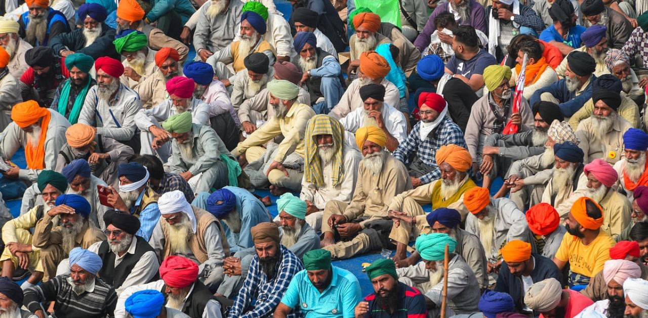 Thousands of farmers from Punjab, Haryana and other areas have stayed put at various Delhi border points, protesting against the new farm law. Credit: PTI Photo