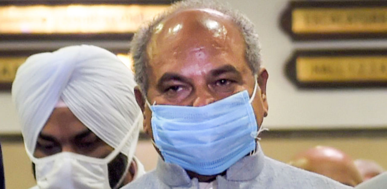 Union Minister Narendra Singh Tomar leaves after a meeting with farmers over the new farm laws, at Vigyan Bhawan in New Delhi, Saturday, Dec. 5, 2020. Credit: PTI Photo