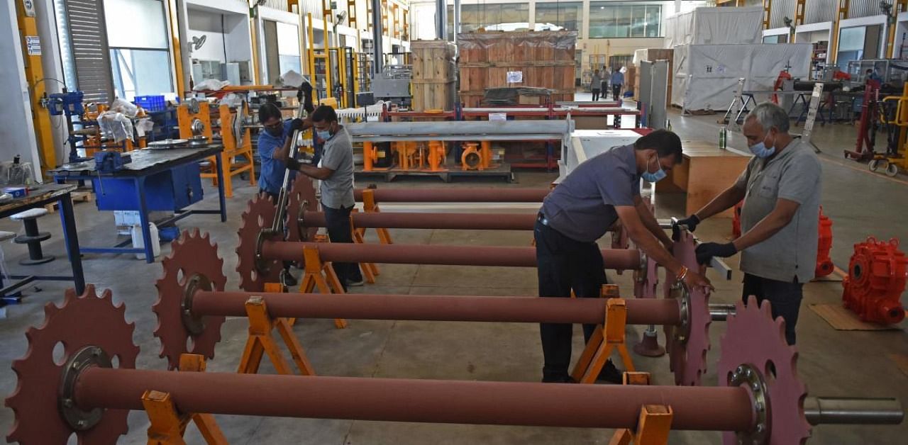 The net sales or the top line of the manufacturing sector, during the September quarter, had shrunk by 10.3% to Rs 8.39 lakh crore from Rs 9.36 lakh crore during the corresponding quarter last year. Credit: AFP Photo