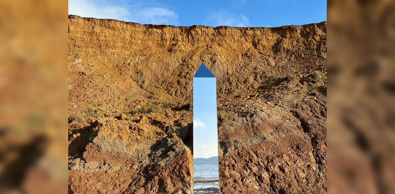 A handout picture released courtesy of the Twitter feed of @AlexiaRFishwick shows an obelisk standing on Compton Beach on the southern western coast of the Isle of Wight on December 6, 2020. Credit: AFP