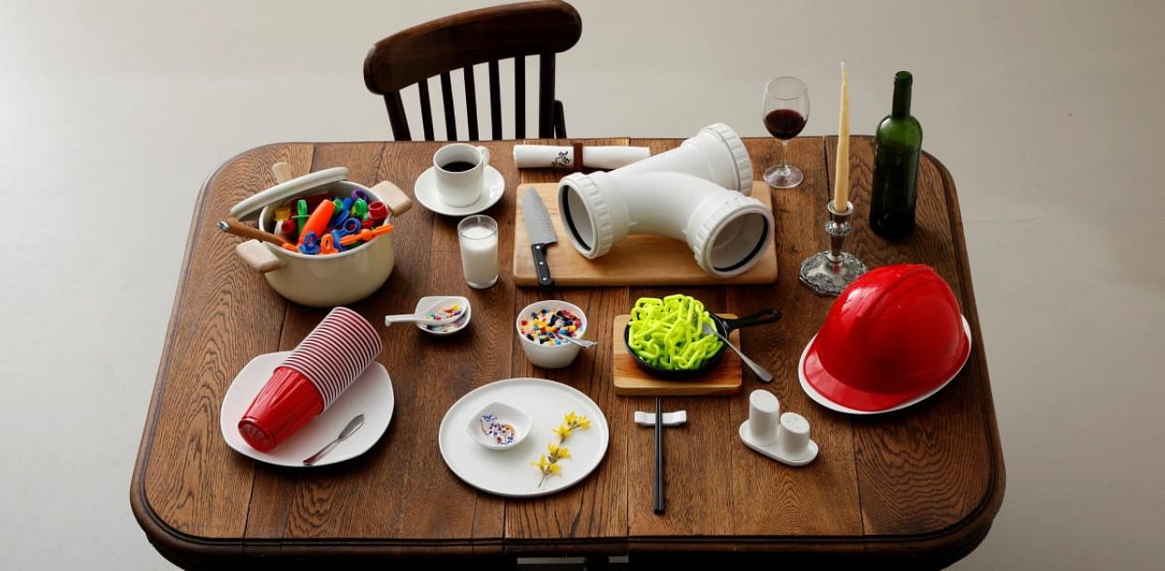 Various plastic goods weighing 3.15 kilograms, which is equivalent to the amount of plastic that someone could eat in ten years, are displayed on a table in this illustration taken in Tokyo, Japan. Credit: Reuters Photo