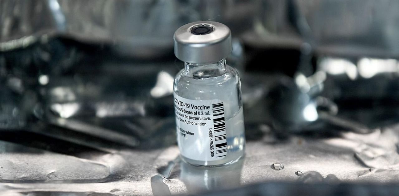 A phial of Pfizer-BioNTech Covid-19 vaccine is seen on a tray at the Louisa Jordan Hospital in Glasgow. Credit: AFP photo.