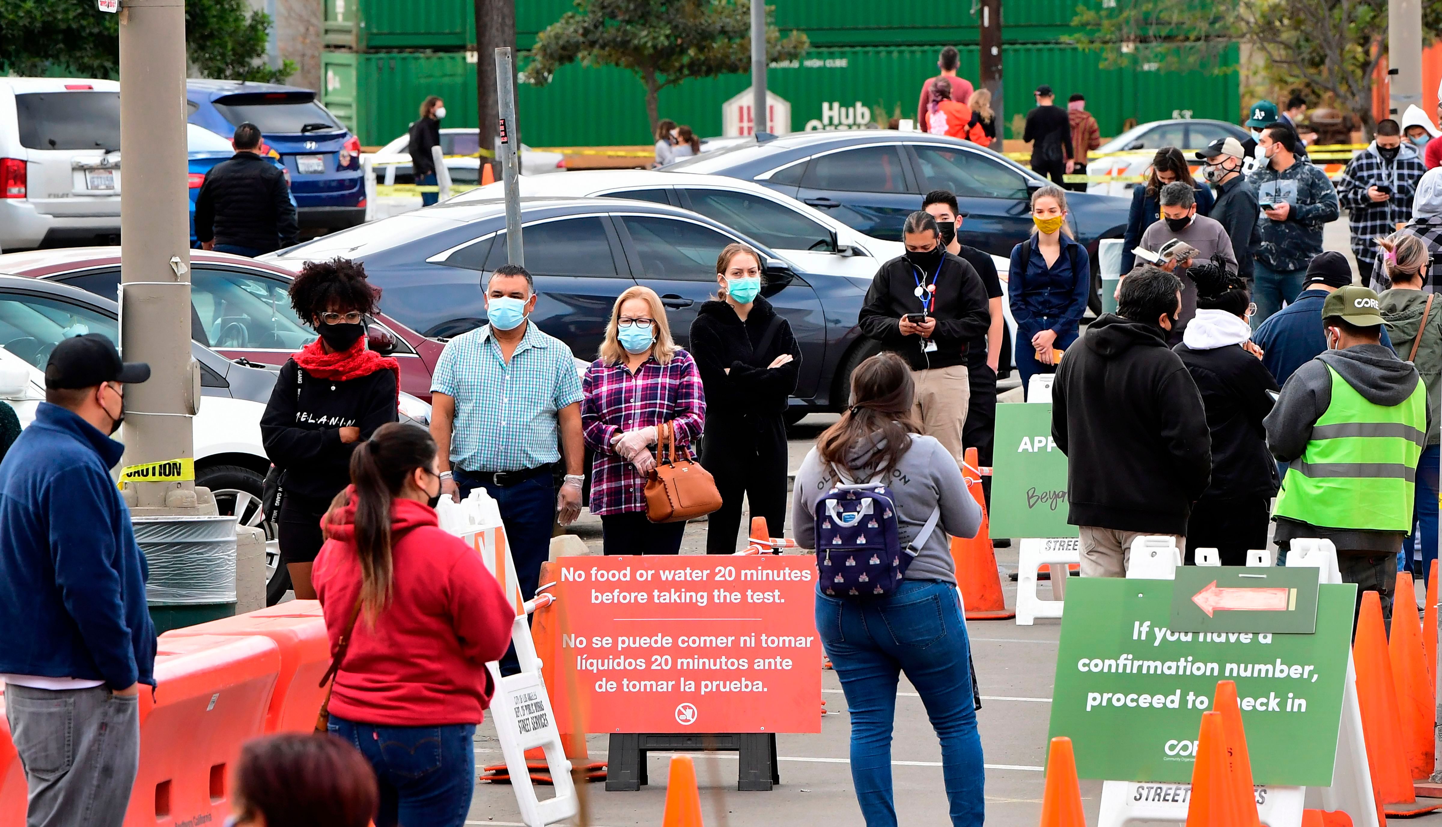 People wait in line at a COVID-19 testing center despite the Stay-At-Home regulation underway in Los Angeles, California. Credit: AFP Photo