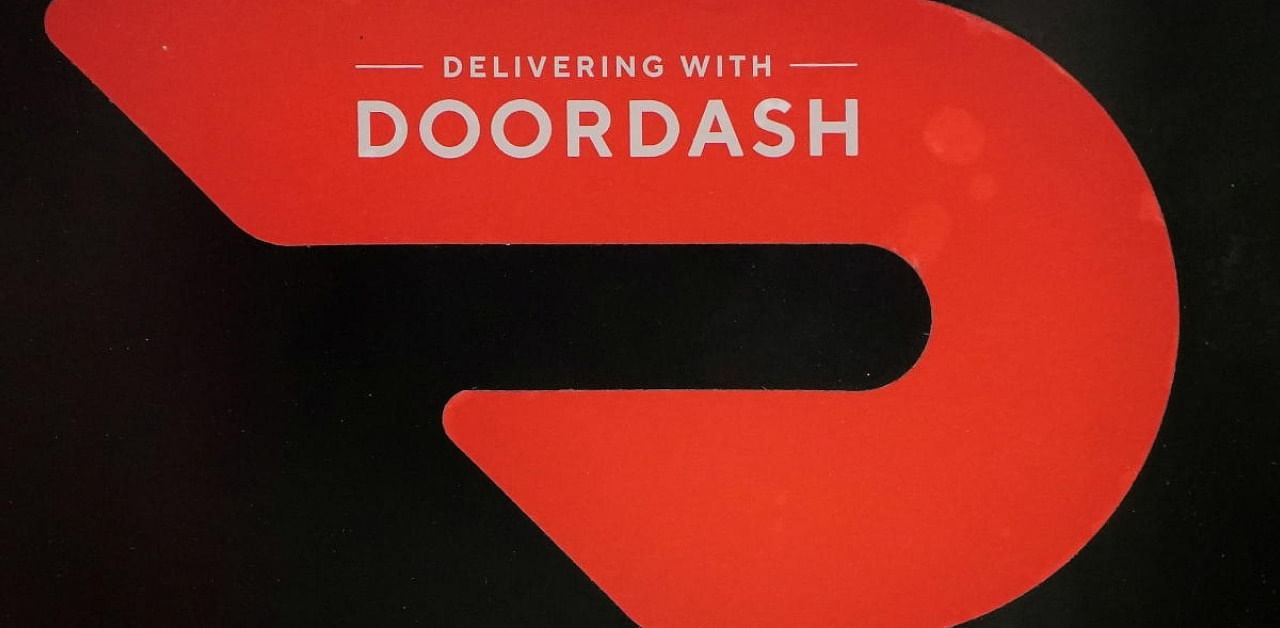 A DoorDash sign is pictured on a restaurant on the day they hold their IPO in the Manhattan borough of New York City. Credit: Reuters Photo