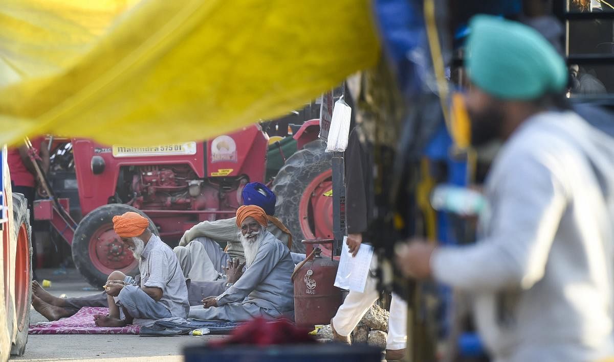Farmers at the Singhu border during their 'Delhi Chalo' protest against the new farm laws, in New Delhi. Credit: PTI Photo. 