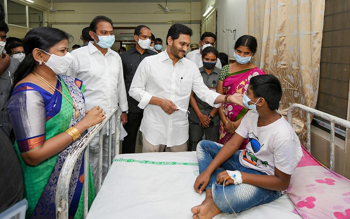 Godavari: Andhra Pradesh CM Y S Jagan Mohan Reddy meets patients who fell ill, suspectedly due to water contamination, at a hospital in Eluru town, Godavari district, Monday, Dec. 7, 2020. (PTI Photo)(PTI07-12-2020_000044B)