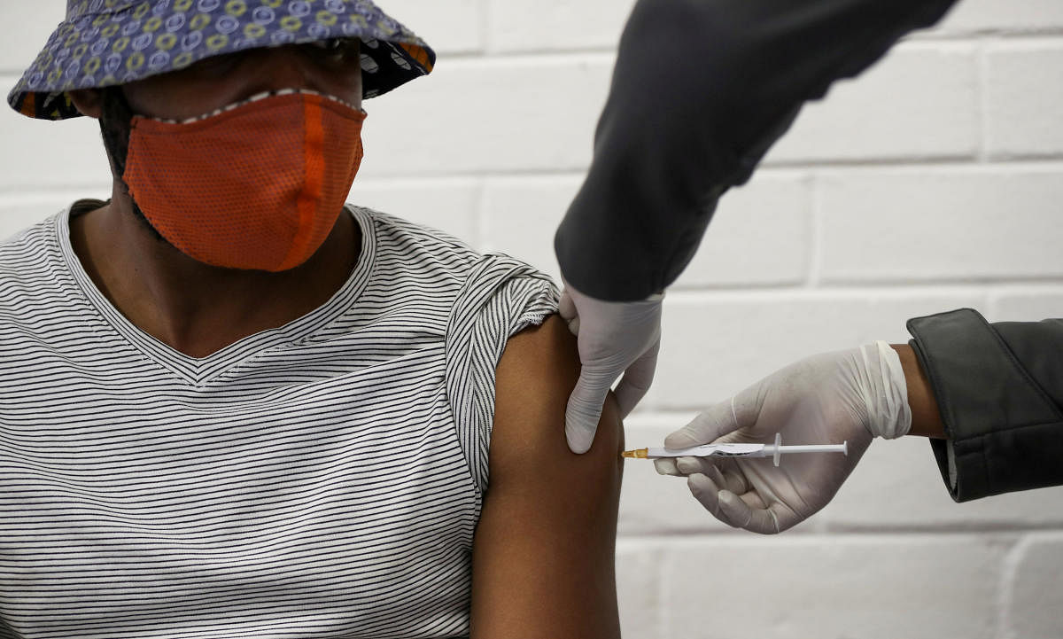 A volunteer receives an injection from a medical worker during the country's first human clinical trial for a potential vaccine against the novel coronavirus. Credit: Reuters photo. 