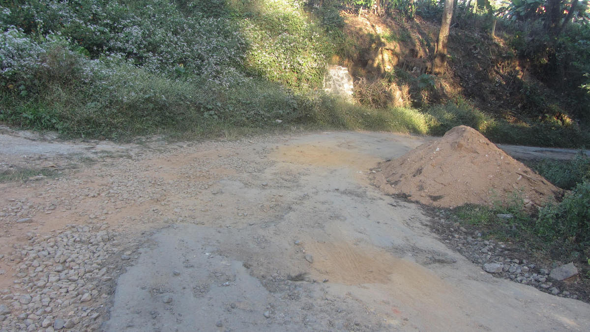 The pathetic condition of Moornadu-Kumbaladalu Road.