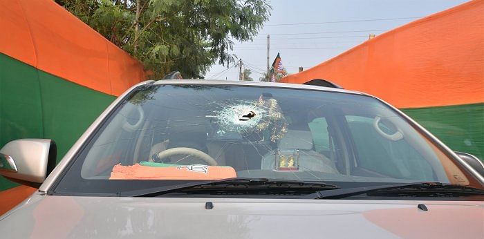 A vehicle of BJP National President JP Nadda's convoy damaged after stone-pelting by alleged TMC activists at Sirakal near Diamond Harbour, in South 24 Pargana, Thursday, Dec 10, 2020. Credit: PTI