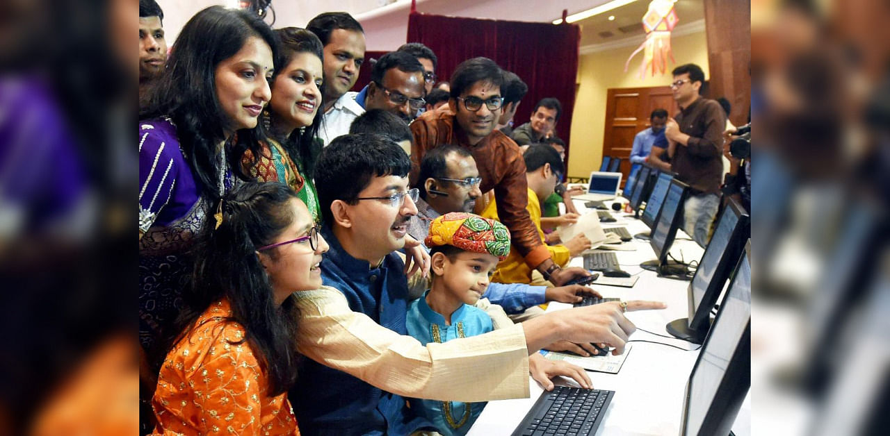 Brokers react during Muhurat Trading session on BSE. Credit: PTI File Photo