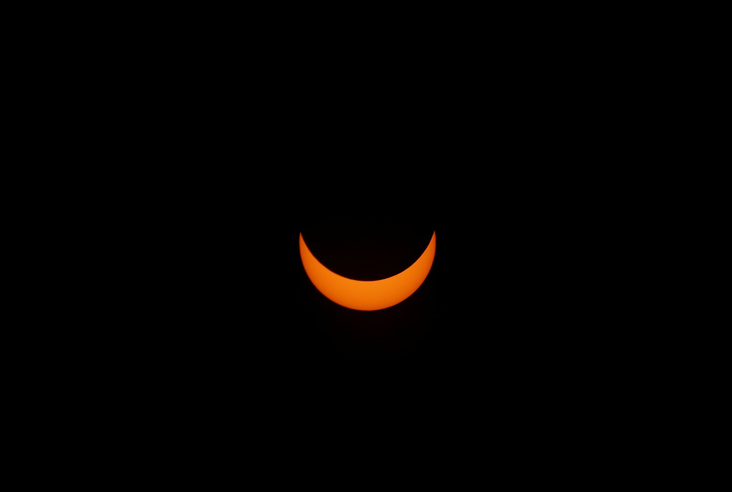 A partial solar eclipse is pictured in Buenos Aires, Argentina, December 14, 2020. Credit: REUTERS