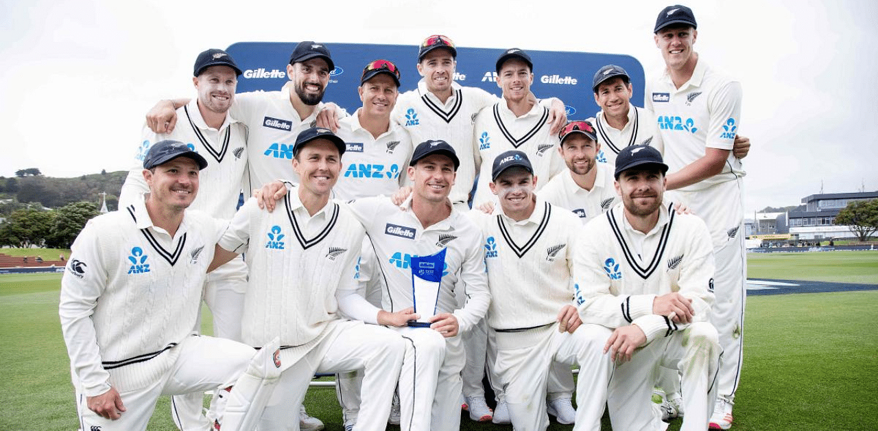 New Zealand pose for a photo as they celebrate after their series win during the fourth day of the second cricket Test match between New Zealand and the West Indies at the Basin Reserve in Wellington. Credit: AFP