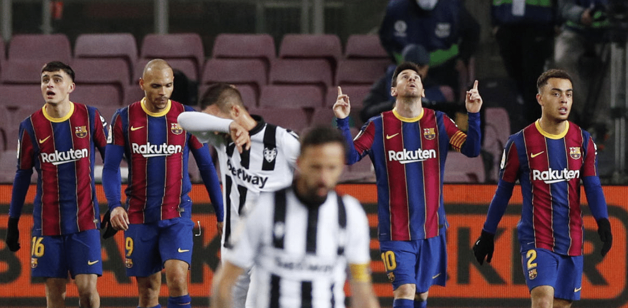 The Argentine punched the air more in relief than celebration, having fired blanks in Barca's recent painful defeats by Cadiz and Juventus. Credit: Reuters