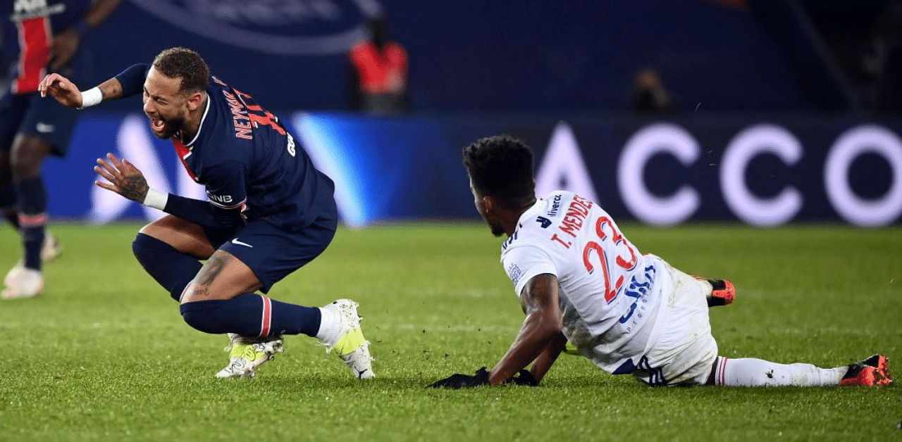 Neymar appeared to twist his ankle awkwardly under a challenge from Thiago Mendes in stoppage time, who was later sent off. Credit: AFP