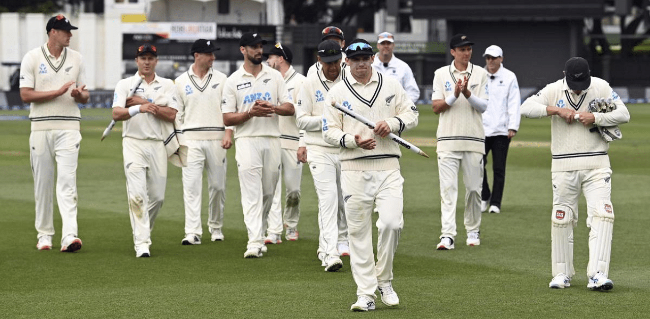 New Zealand's captain Tom Latham, center, leads his players off the ground after defeating the West Indies on the fourth day of their second cricket test at Basin Reserve in Wellington. Credit: AP/PTI