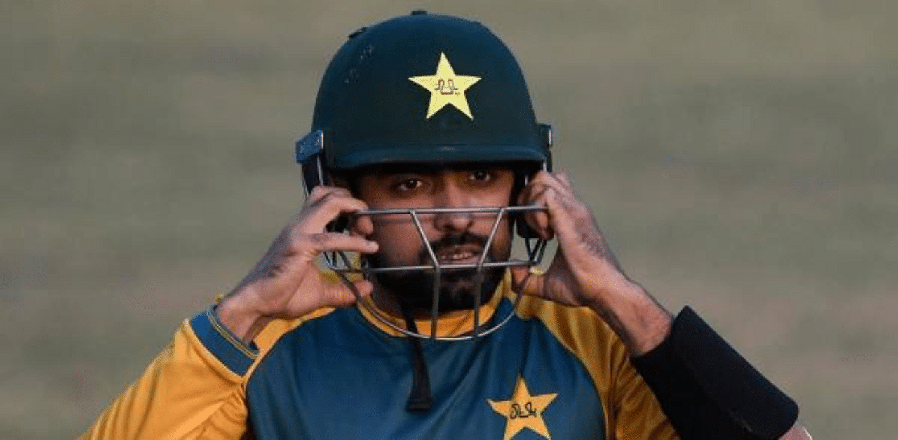 Babar Azam will not be able to practise for 12 days and will miss the three Twenty20 matches starting in Auckland on Friday. Credit: AFP