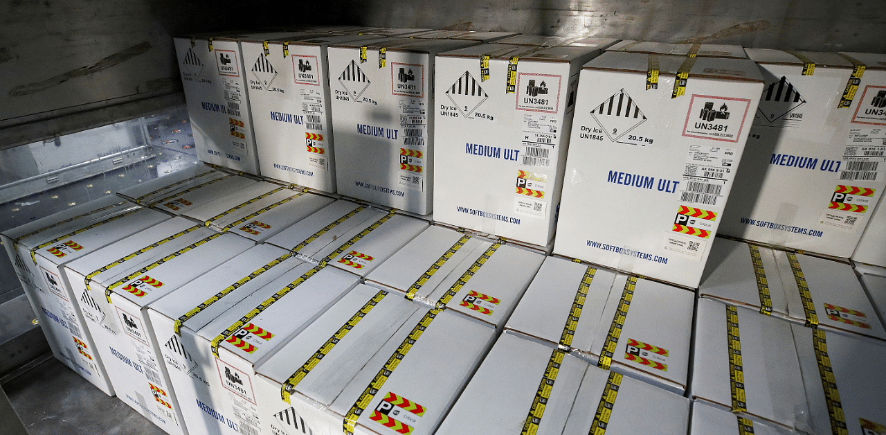 Boxes containing Pfizer's Covid-19 vaccine are unloaded from air shipping containers at UPS Worldport, in Louisville, Kentucky. Credit: Reuters