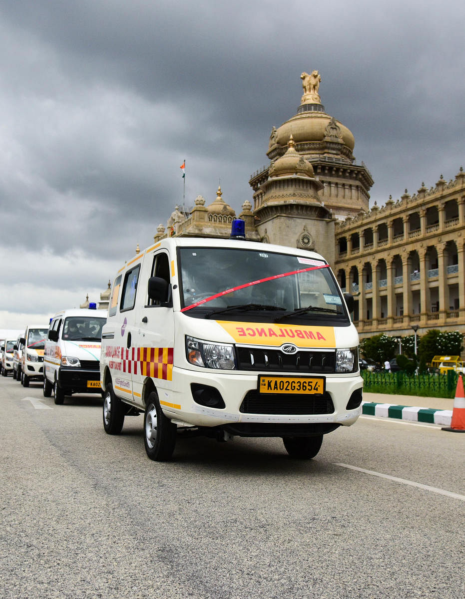 Ambulances before being handed over to state government by a private entertainment media house to fight the ongoing COVID-19 pandemic, at VidhanaSoudha, in Bengaluru on Tuesday. Credit: DH Photo/B H Shivakumar