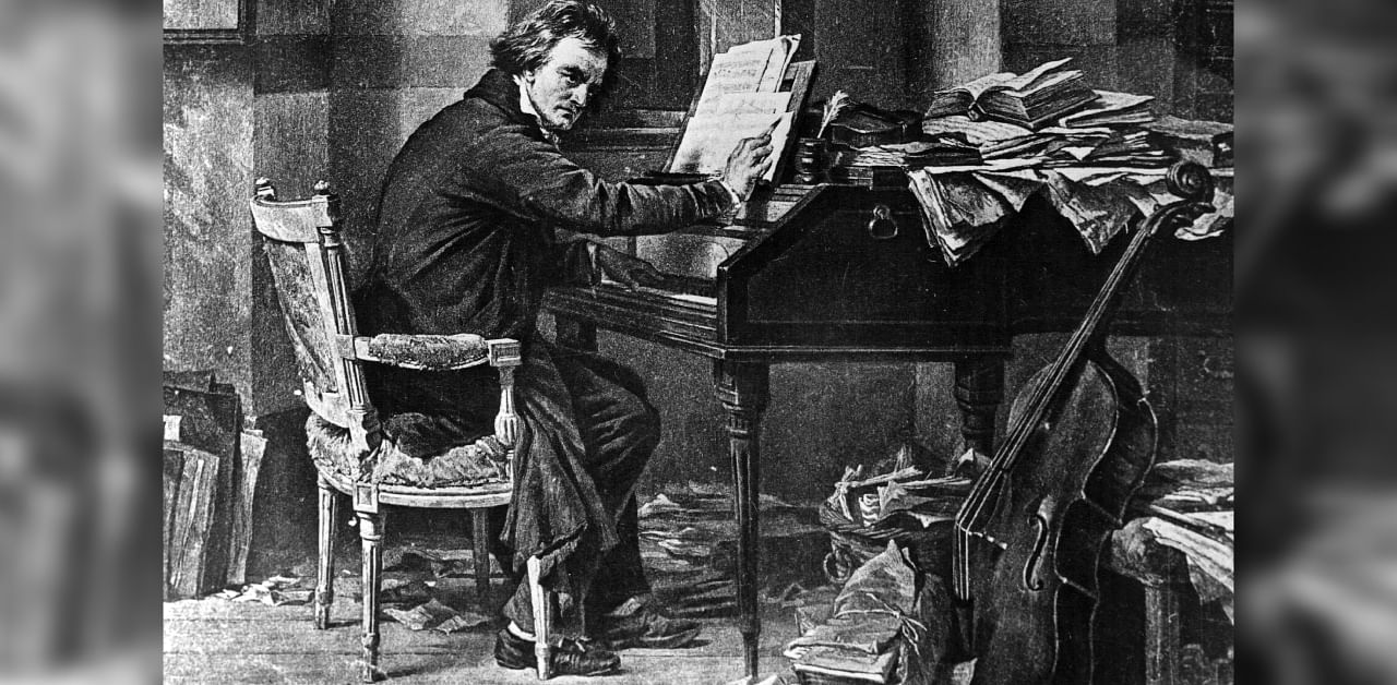 German composer Ludwig van Beethoven (1770 - 1827) composing at a a piano, circa 1800. Credit: GettyImages