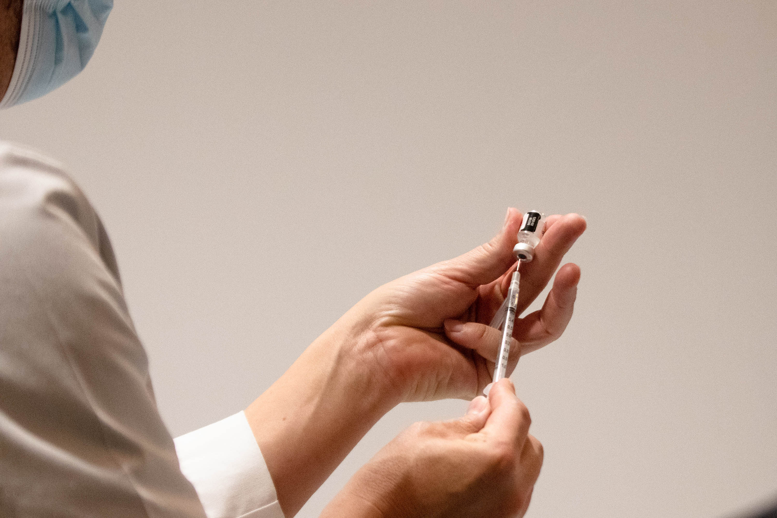 Jeff Doucette, Chief Nursing Officer at Jefferson Health, prepares a Covid-19 vaccine at Thomas Jefferson University Hospital in Philadelphia. Credit: AFP Photo