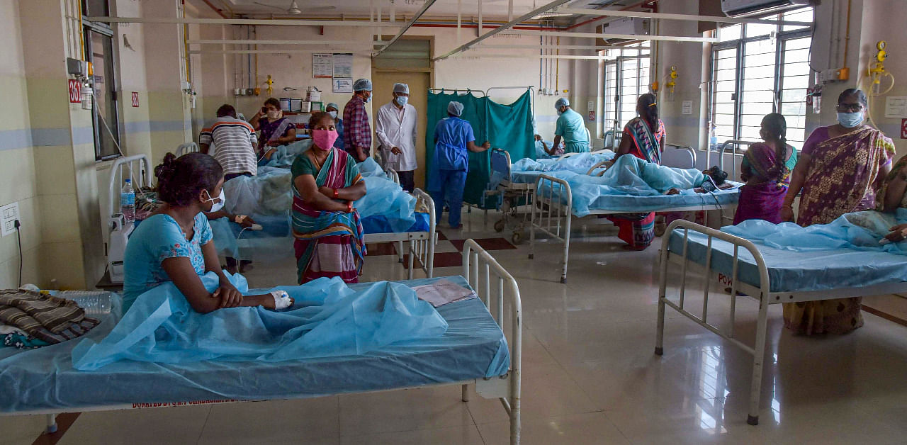 Andhra Pradesh Health Minister Alla Kali Krishna Srinivas (Alla Nani) meet patients, who fell ill suspectedly due to water contamination in Eluru town, at a hospital in Vijayawada. Credit: PTI Photo