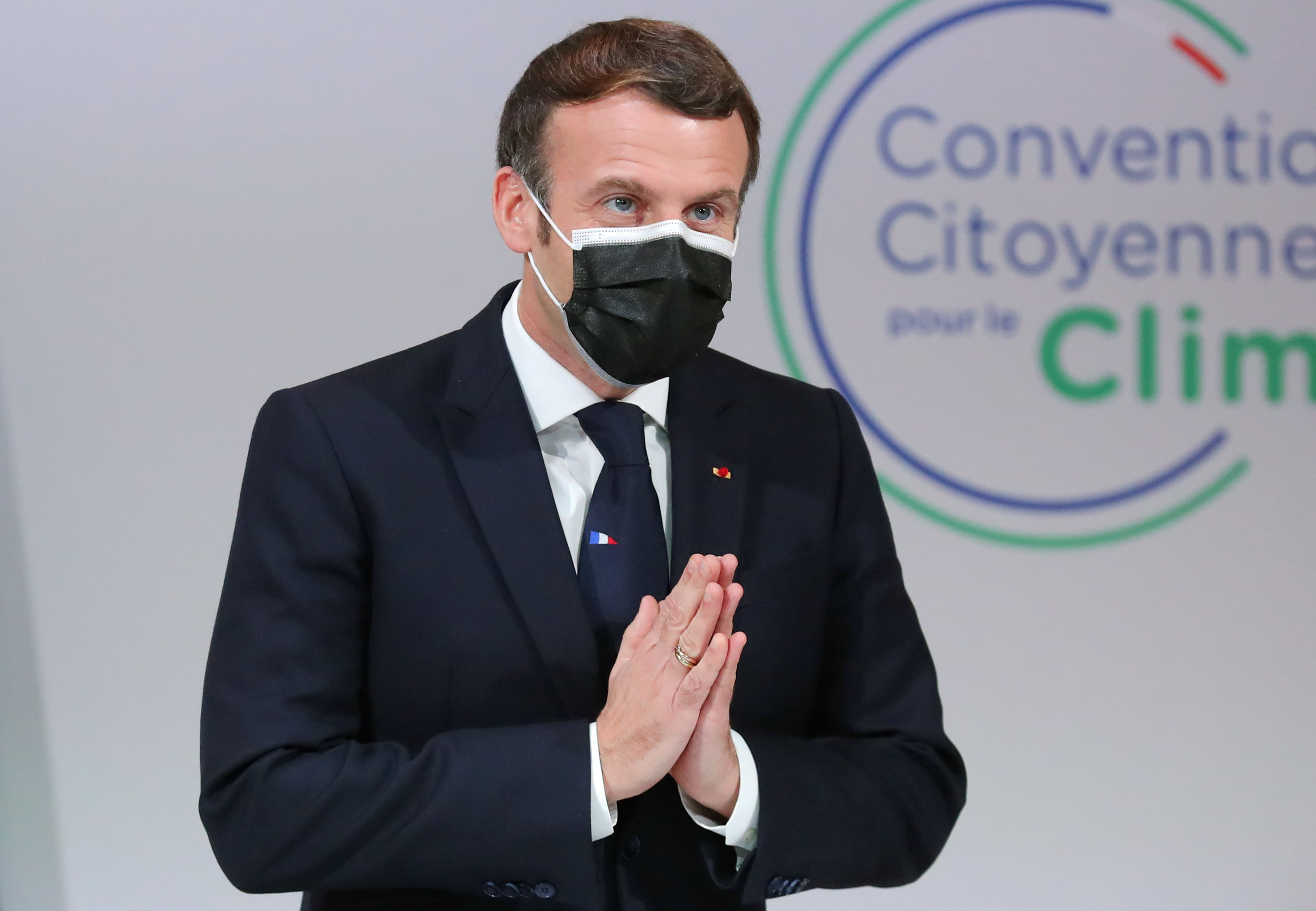 French President Emmanuel Macron gestures as he attends a meeting with members of the Citizens' Convention on Climate. Credit: AFP Photo
