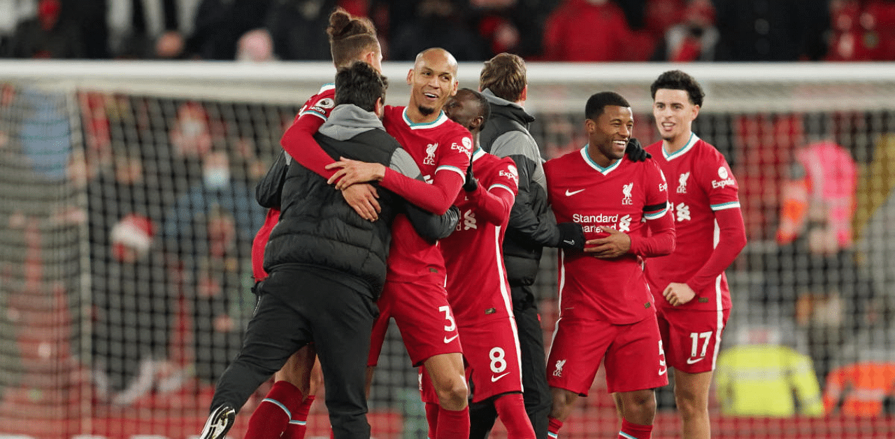 Liverpool's Fabinho and teammates celebrate after the match. Credit: Reuters Photo 