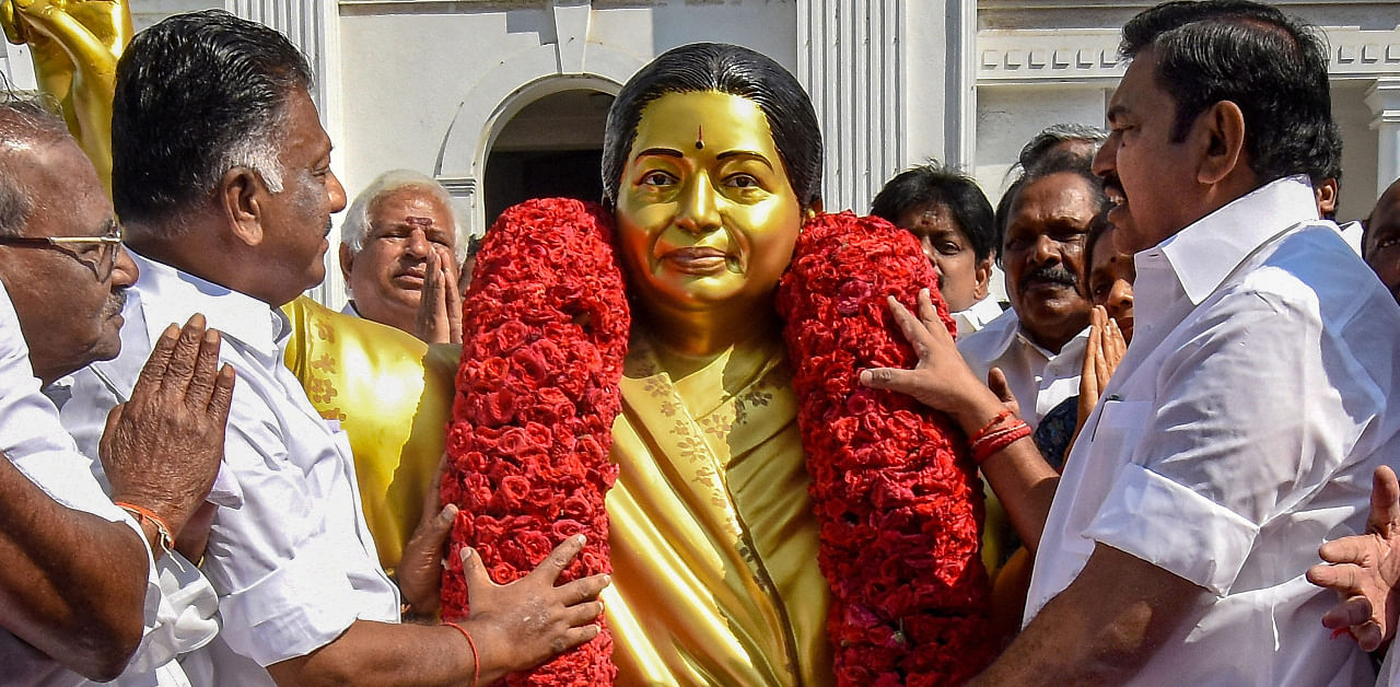 Tamil Nadu Chief Minister Edappadi K Palaniswami and Deputy Chief Minister O Panneerselvam pay tribute to former late Tamil Nadu chief minister J Jayalalithaa. Credit: PTI File Photo