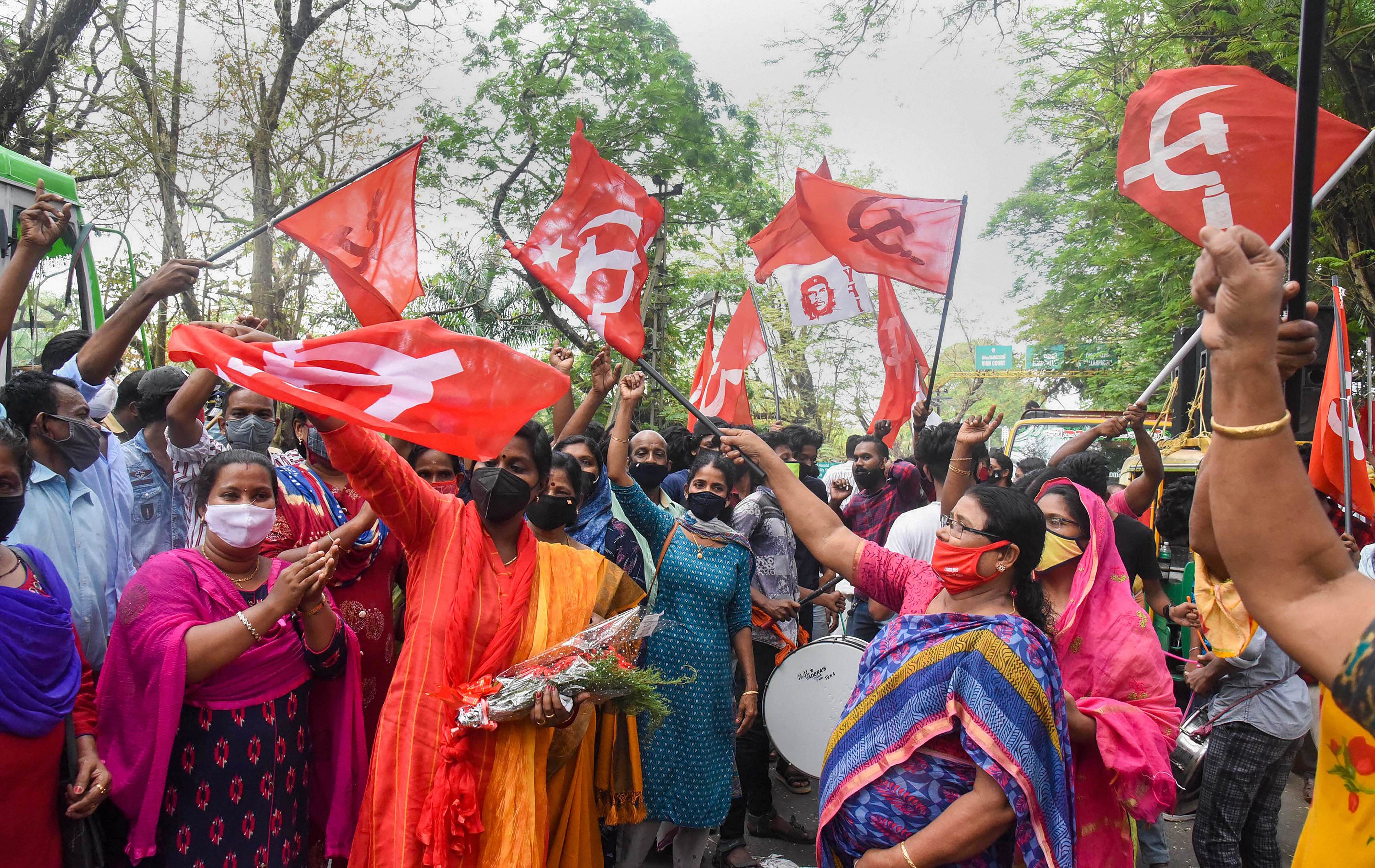 Left Democratic Front (LDF) supporters celebrate their party's lead in the Kerala local body elections in Kochi, Wednesday, Dec. 16, 2020. Credit: PTI Photo