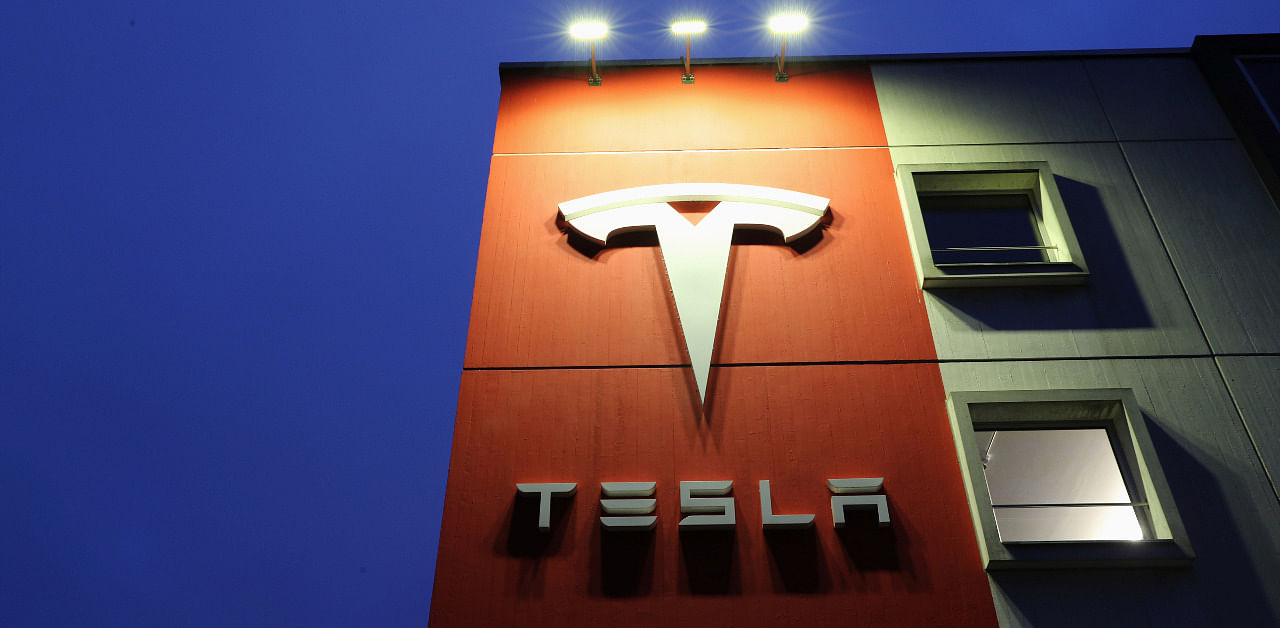 A logo of car manufacturer Tesla is seen at a branch office. Credit: Reuters Photo