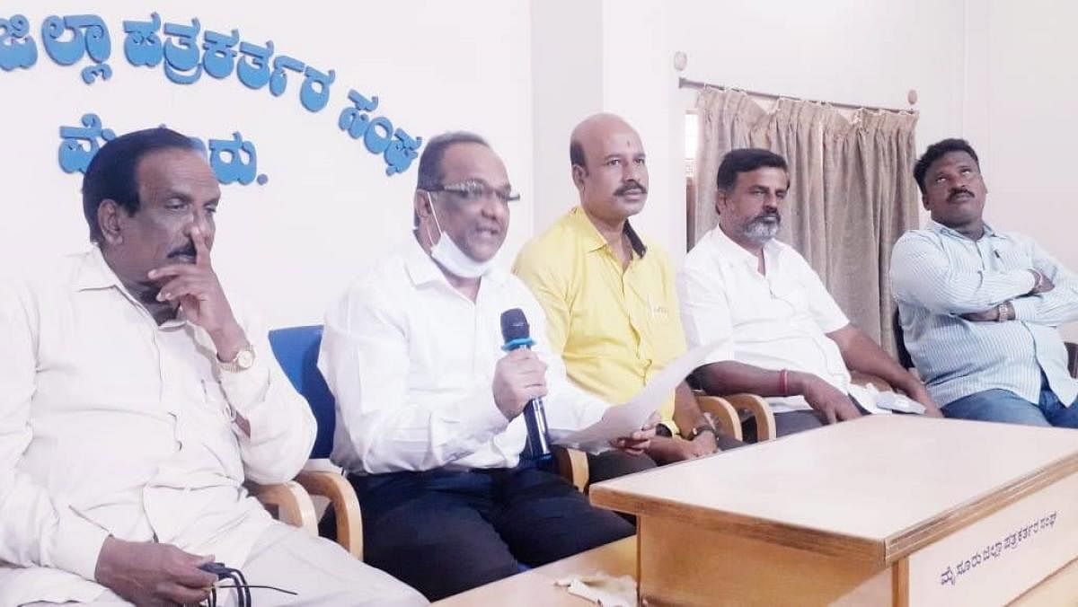 JD(S) state spokesperson N R Ravichandregowda addresses a media conference in Mysuru on Thursday. JD(S) office-bearers R Mudduraj, Prakash Priyadarshan, Manjunath and Syed are seen. Credit: DH PHOTO