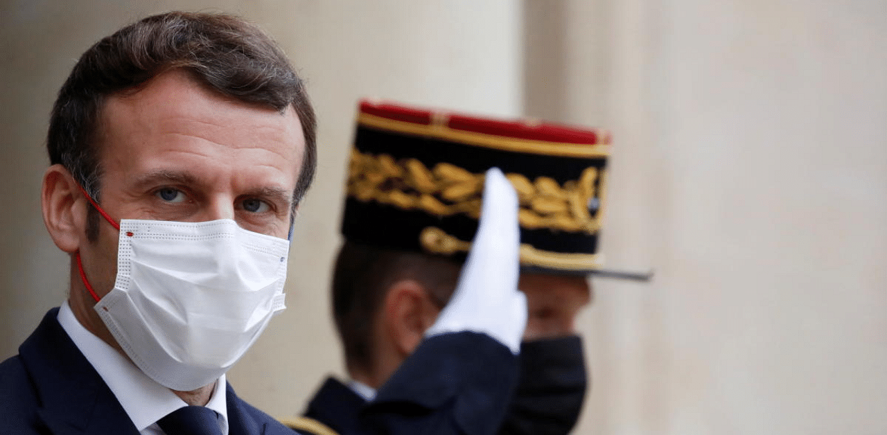While Macron usually wears a mask and adheres to social distancing rules, and has insisted that his virus strategy is driven by science, the president has been captured on camera in recent days violating France's virus-control guidelines. Credit: Reuters