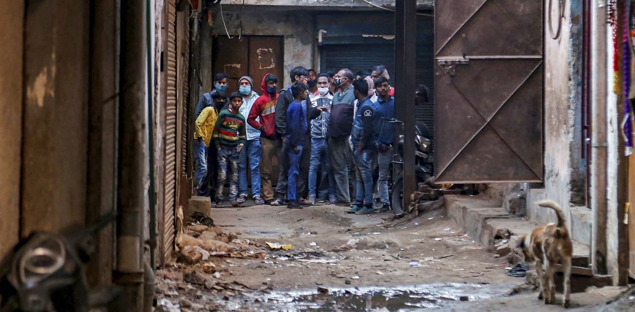 Delhi Police and NDRF team at the site of a building collapse in Vishnu Garden locality, in New Delhi. Credit: PTI Photo