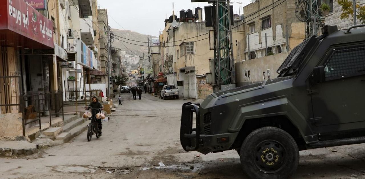 A Palestinian security forces armoured vehicle is pictured at the entrance to Balata camp, near the occupied West Bank city of Nablus. Credit: AFP.