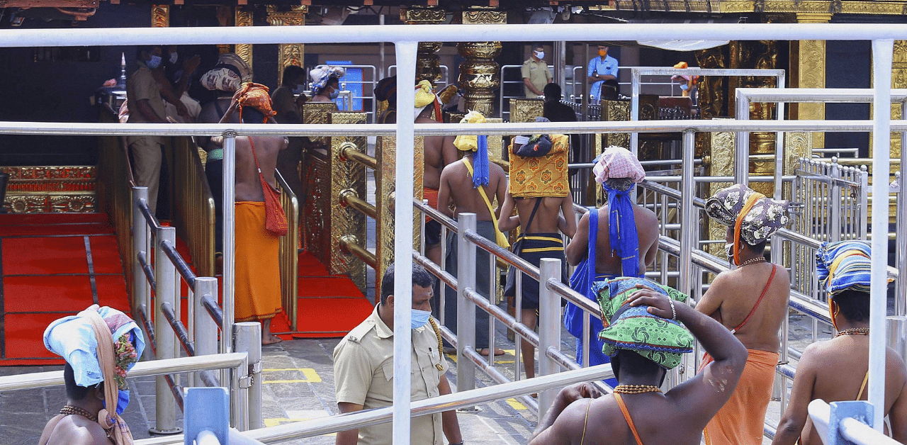 The decision was taken in the backdrop of a recent directive by the Kerala High Court, which also raised the number of pilgrims permissible daily to 5,000. Credit: PTI
