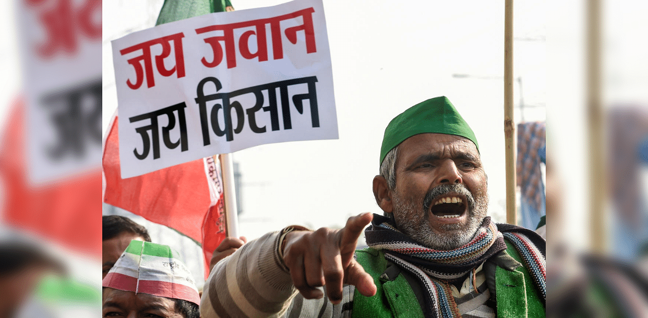 Bharatiya Kisan Union (BKU) members during a protest against the Centre's new farm laws, at Ghazipur border, New Delhi, Monday, Dec. 21, 2020. Credit: PTI Photo