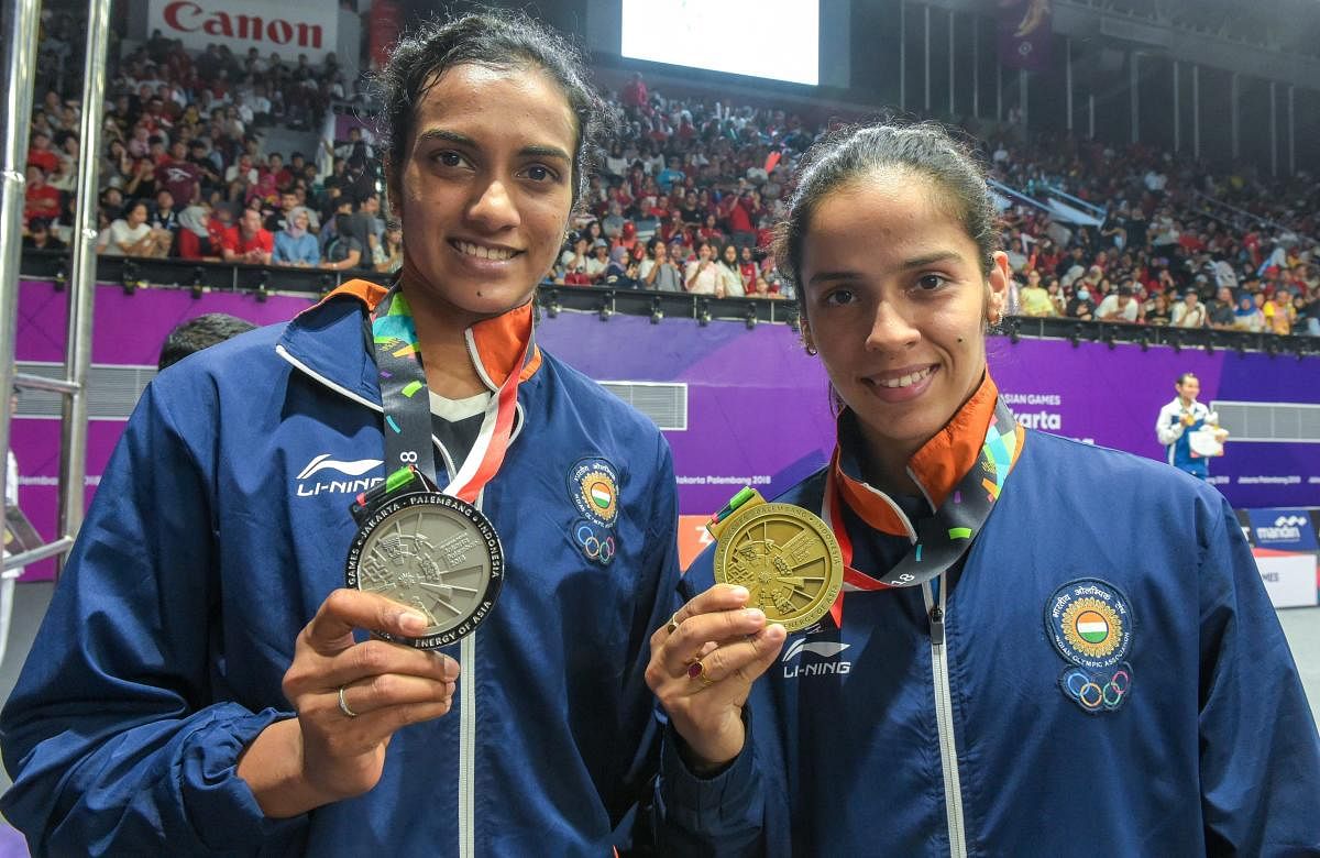 PV Sindhu (L) and Saina Nehwal (R). Credit: PTI