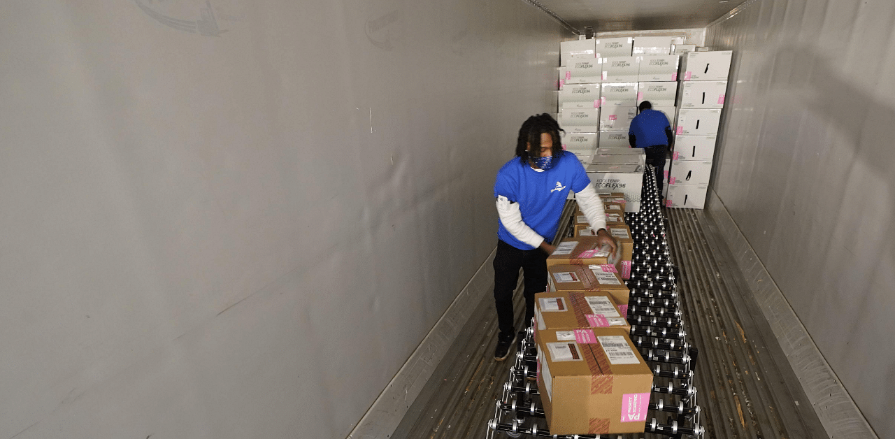 Boxes containing the Moderna Covid-19 vaccine are prepared to be shipped at the McKesson distribution center in Olive Branch, Mississippi. Credit: AFP