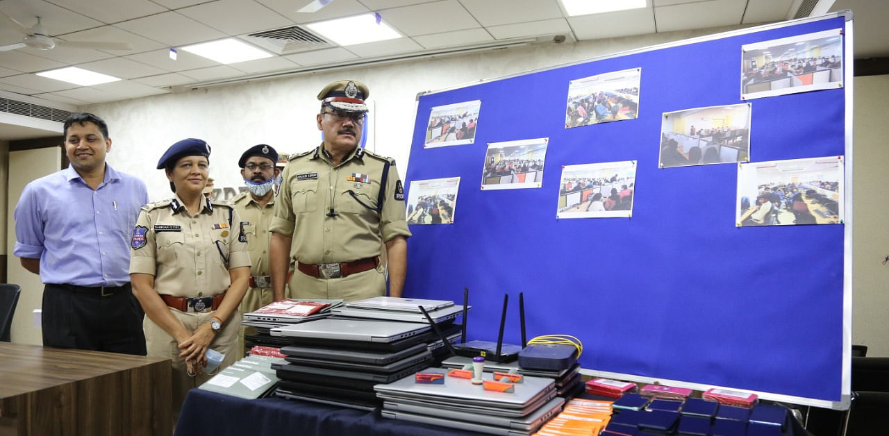Raids at the corporate-style centres resulted in the seizure of about 700 laptops, servers, computer systems. Credit: DH Photo